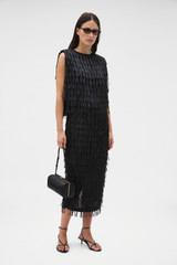Profile view of model wearing the Oroton Ribbon Detail Top in Black and 100% polyester double georgette fabric for Women .
