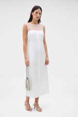 Profile view of model wearing the Oroton Sheath Dress in Antique White and 100% silk twill fabric for Women .