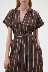 Profile view of model wearing the Oroton Stripe Detail Dress in Milk Chocolate and 100% cotton fabric for Women .