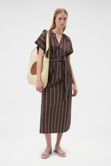Profile view of model wearing the Oroton Stripe Detail Dress in Milk Chocolate and 100% cotton fabric for Women .