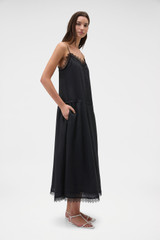 Profile view of model wearing the Oroton Lace Trim Sundress in Black and 100% ramie fabric for Women .