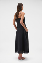 Profile view of model wearing the Oroton Lace Trim Sundress in Black and 100% ramie fabric for Women .