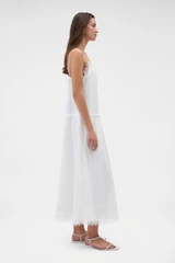 Profile view of model wearing the Oroton Lace Trim Sundress in White and 100% ramie fabric for Women .