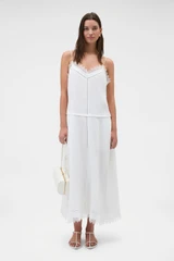 Profile view of model wearing the Oroton Lace Trim Sundress in White and 100% ramie fabric for Women .