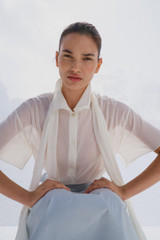 Profile view of model wearing the Oroton Scarf Detail Top in Antique White and 100% cotton voile fabric for Women .