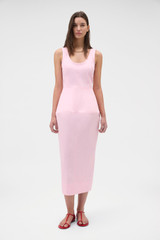 Profile view of model wearing the Oroton Sculpture Tank Dress in Pink Rose and 98% cotton and 2% spandex blend fabric for Women .