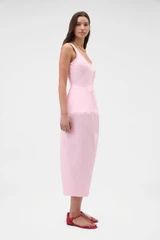 Profile view of model wearing the Oroton Sculpture Tank Dress in Pink Rose and 98% cotton and 2% spandex blend fabric for Women .