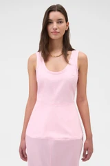 Profile view of model wearing the Oroton Sculpture Tank Dress in Pink Rose and 98% cotton and 2% spandex blend fabric for Women .
