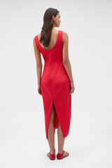 Profile view of model wearing the Oroton Sculpture Tank Dress in Poppy and 98% cotton and 2% spandex blend fabric for Women .