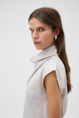Profile view of model wearing the Oroton Maurie Shell Stud Earrings in Worn Silver and Fine silver-plated brass with freshwater pearls for Women .