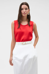 Profile view of model wearing the Oroton Double Satin Tank in Poppy and 100% viscose fabric for Women .