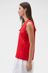 Profile view of model wearing the Oroton Double Satin Tank in Poppy and 100% viscose fabric for Women .