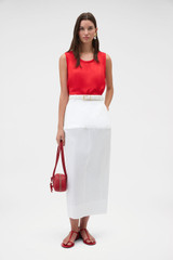 Profile view of model wearing the Oroton Double Satin Tank in Poppy and 100% viscose fabric for Women .