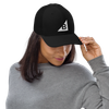 B Mark Trucker Hat right front view on a model.