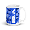 Think Big slogan mug with handle pointing right.