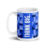 Think Big slogan mug with handle pointing left.