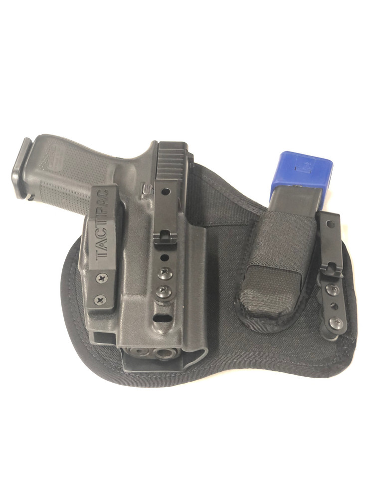 Tilted full front view of the Max X appendix carry holster for the Glock 19 and extra magazine. 