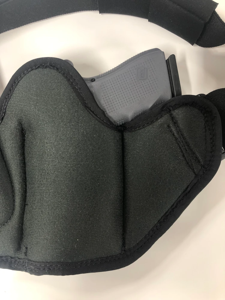 Rear view of the ACS holster with Glock 19 holster to show the full purchase are of the handle of the firearm. 