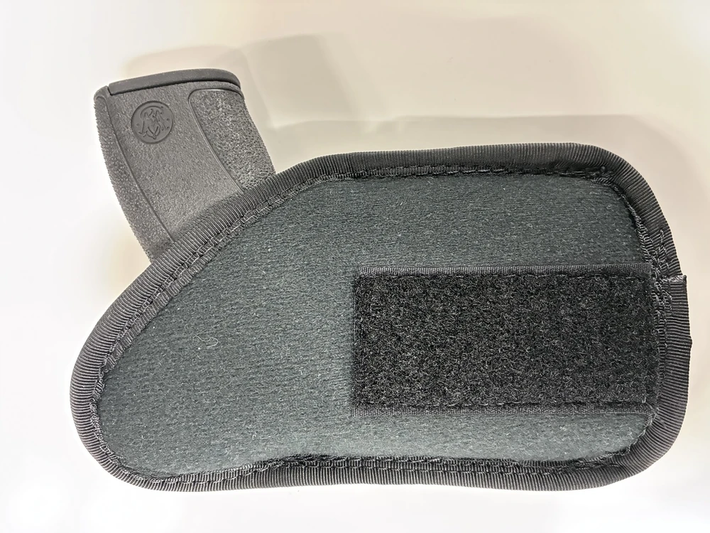 Bottom Rear view of S&W Bodyguard 2.0 .380 holstered in the Micro AFx IWB Concealed Carry Holster clearly showing the loop velcro mating surface for the concealment wedge and the comfortable holster backer.