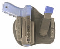 The image shows a Glock 17 sized pistol holstered in the Max X appendix carry holster fit with an extended magazine in the extra magazine caddy. A blue gun is used for emphasis of the size relation to the appendix carry holster.