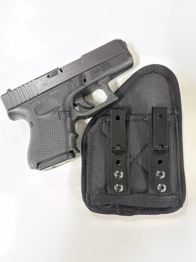 Glock 26 shown next to AFx IWB holster.