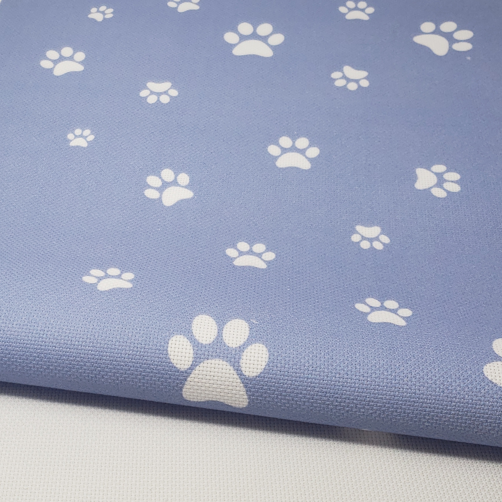 White Paw Prints on Blue Cross Stitch Fabric Fabric Flair