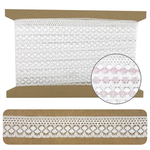 White flat lace with geometric design of spots and dashes.