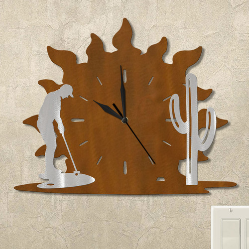 Man Putting and Cactus Sunrise Wall Clock in rust patina