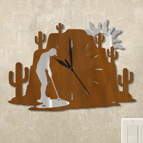 Man Putting Cactus Mountain Wall Clock in rust patina