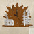 Cabin and Trees Sunrise Wall Clock in rust patina