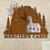 Cabin Evergreen Mountain Personalized Wall Clock in rust patina