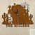 Dancing Kokopelli Cactus Mountain Personalized Wall Clock in rust patina