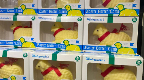 Malczewski’s Easter Butter Lamb made from real butter, packaged in a festive box with a red ribbon, a traditional Buffalo Easter basket item.