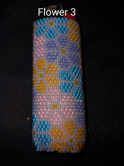 Toho Seed Bead 11/0 161, 801, 191B, 931 and 12F woven with Toho One G thread.