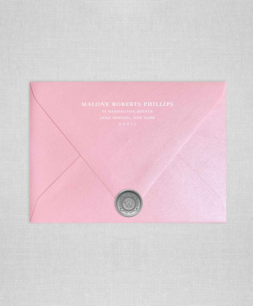 Rose Quartz wedding envelopes with white ink return addressing and silver wax seals