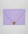 Lavender wedding envelopes with white ink return addressing and gold wax seals