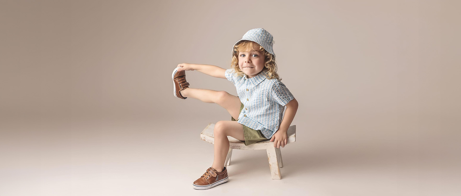 A child sitting on a bench