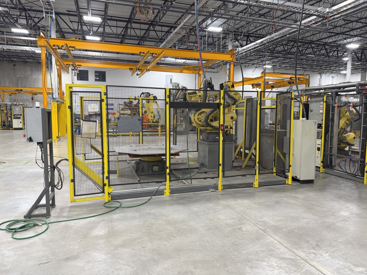 Fanuc R-2000iA/ 200FO Robot with R-J3iB Control, Turntable, ARO Spot Welder