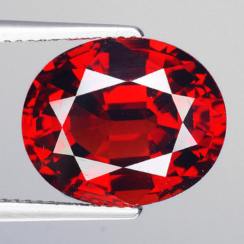 5.5x4.5 mm Oval {0.72ct} Top Luster Natural Intense Orange Red Sapphire [Flawless-VVS]