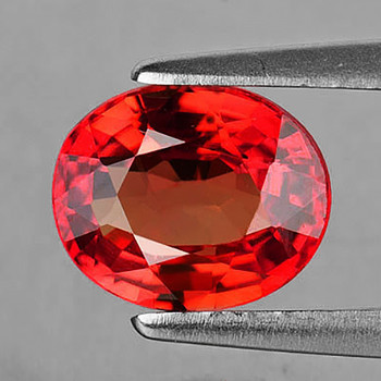 5.5x4.5 mm Oval {0.70ct} Top Luster Natural Intense Orange Red Sapphire [Flawless-VVS]