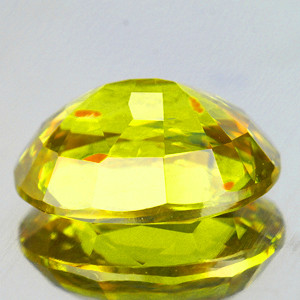 6.5x5.5 mm Oval 1.05cts Superb Luster Rainbow Spark Natural Canary Yellow Sphene [VVS]