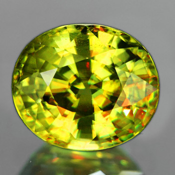 6.5x5.5 mm Oval 1.05cts Superb Luster Rainbow Spark Natural Canary Yellow Sphene [VVS]