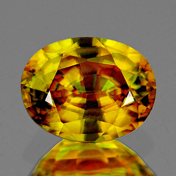 7.5x5.5 mm Oval {1.22ct} Superb Luster Rainbow Spark Natural Intense Yellow Sphene [VVS]-Top Grade