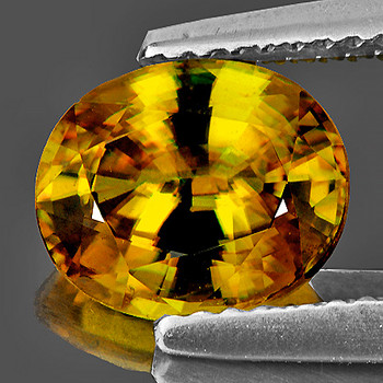 7x6 mm Oval 1.05ct Superb Luster Rainbow Spark Natural Honey Yellow Sphene [VVS]