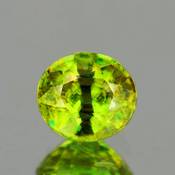6.5x5.5 mm Oval 0.95ct Superb Luster Rainbow Spark Natural Canary Green Sphene [VVS]-Top Grade