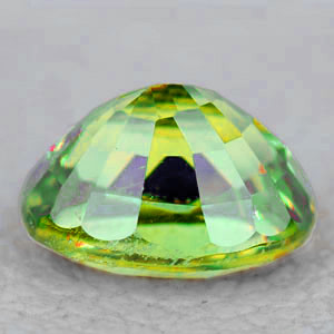 5.5x4.5 mm Oval 0.62ct Superb Luster Rainbow Spark Natural Canary Green Sphene [VVS]