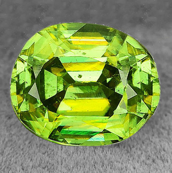 8x7 mm Oval 1.45ct Superb Luster Rainbow Spark Natural Canary Green Sphene [SI]