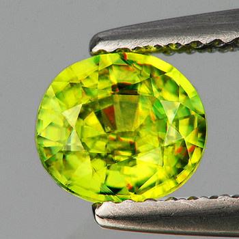 6.5x6 mm Oval 1.38ct Top Level Rainbow Sparkles Natural Canary Yellow Sphene [SI]
