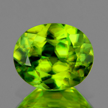 5.5x5 mm Oval 0.72ct Top Level Rainbow Sparkles Natural Canary Yellow Sphene [SI]