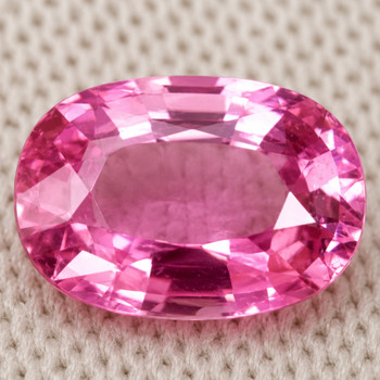 7x5 mm Oval {0.95ct} Fire Luster Natural Top Intense Pink Sapphire [VVS]